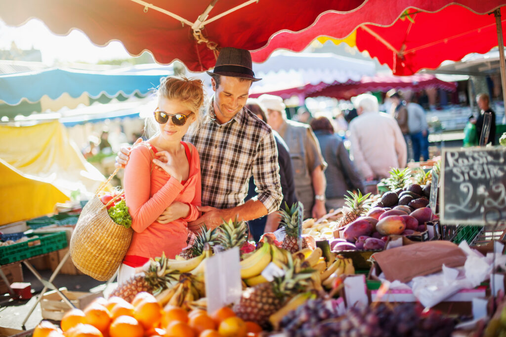 Young couple shops at farmer's market